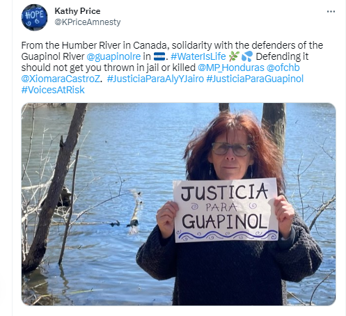 A social media post with a photo in front of the Humber River holding a sign that says Justicia Para Guapinol