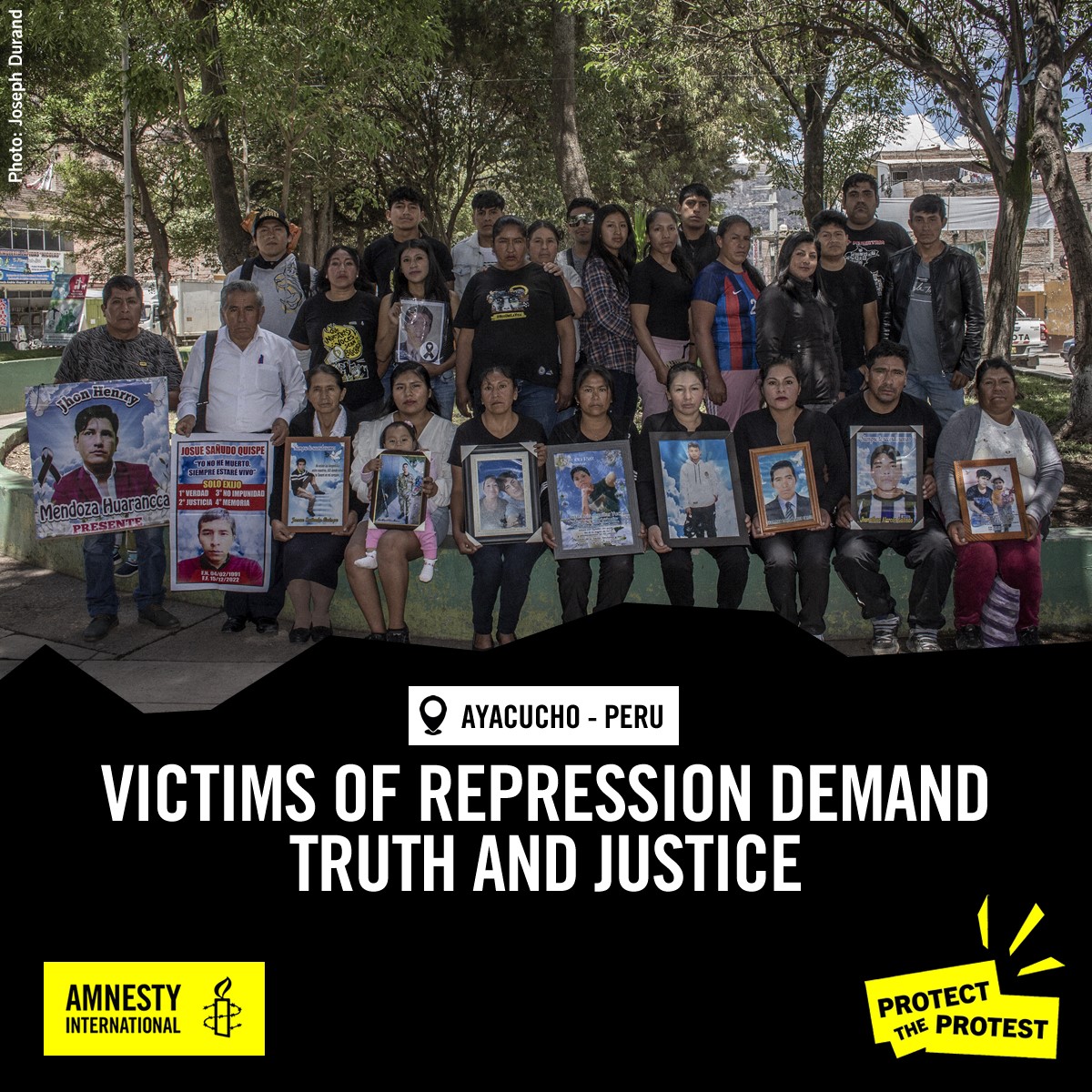 A group of families in Ayacucho hold photos of loved ones killed during lethal repression of protests in that city