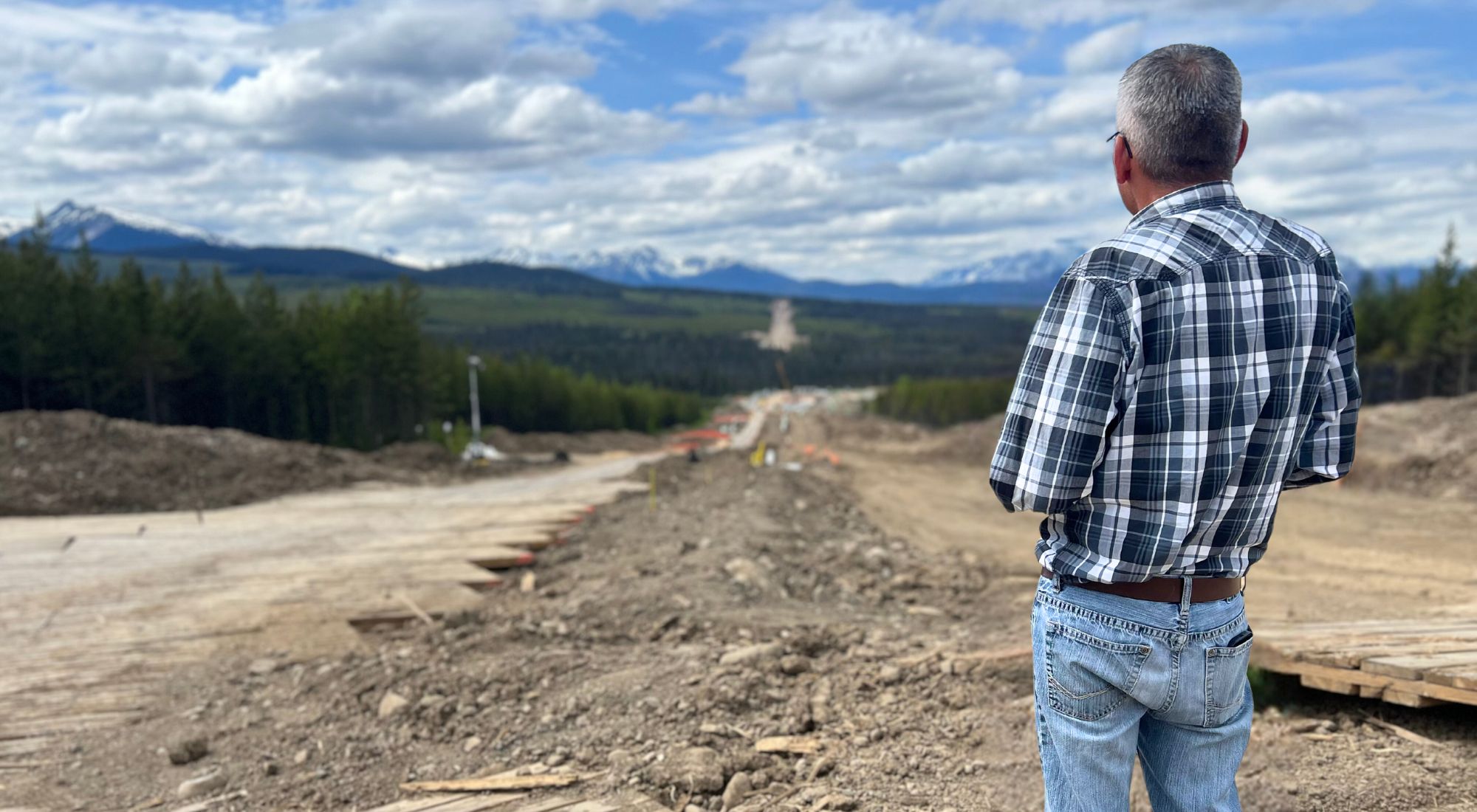 Chief Na'Moks overlooks CGL Pipeline construction road cutting through Wet'suwet'en Territory