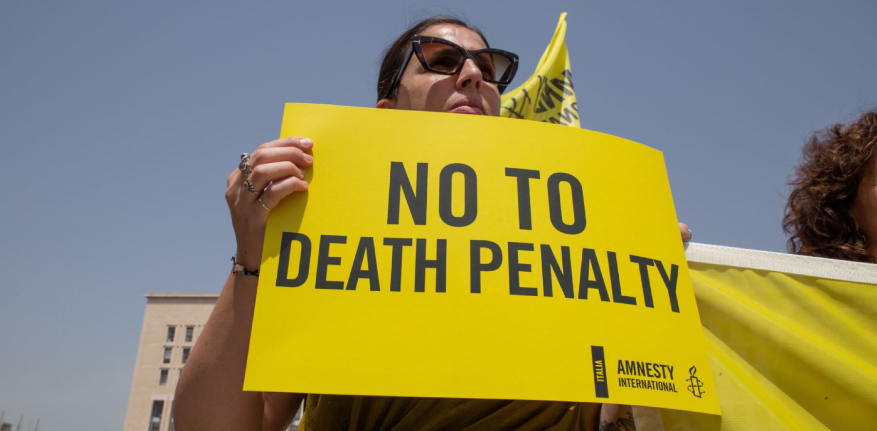 Activist holding placard No to Death Penalty. Photo by Matteo Nardone/Pacific Press/LightRocket via Getty Images