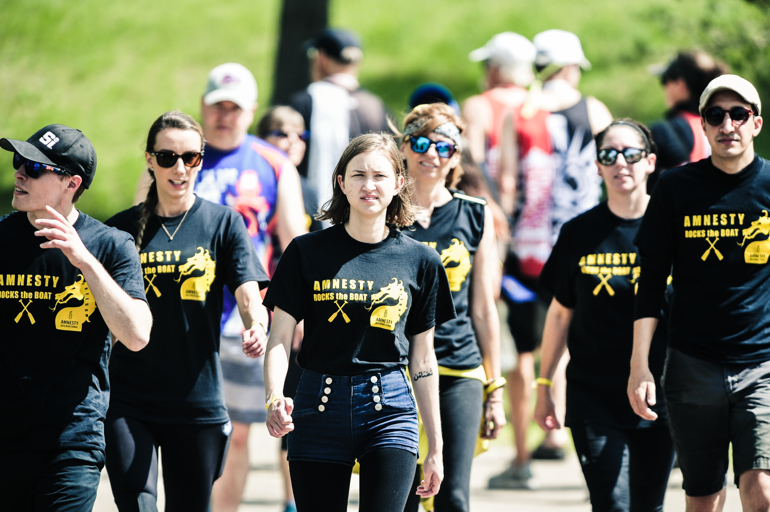 Amnesty Regina volunteer activists walking outside