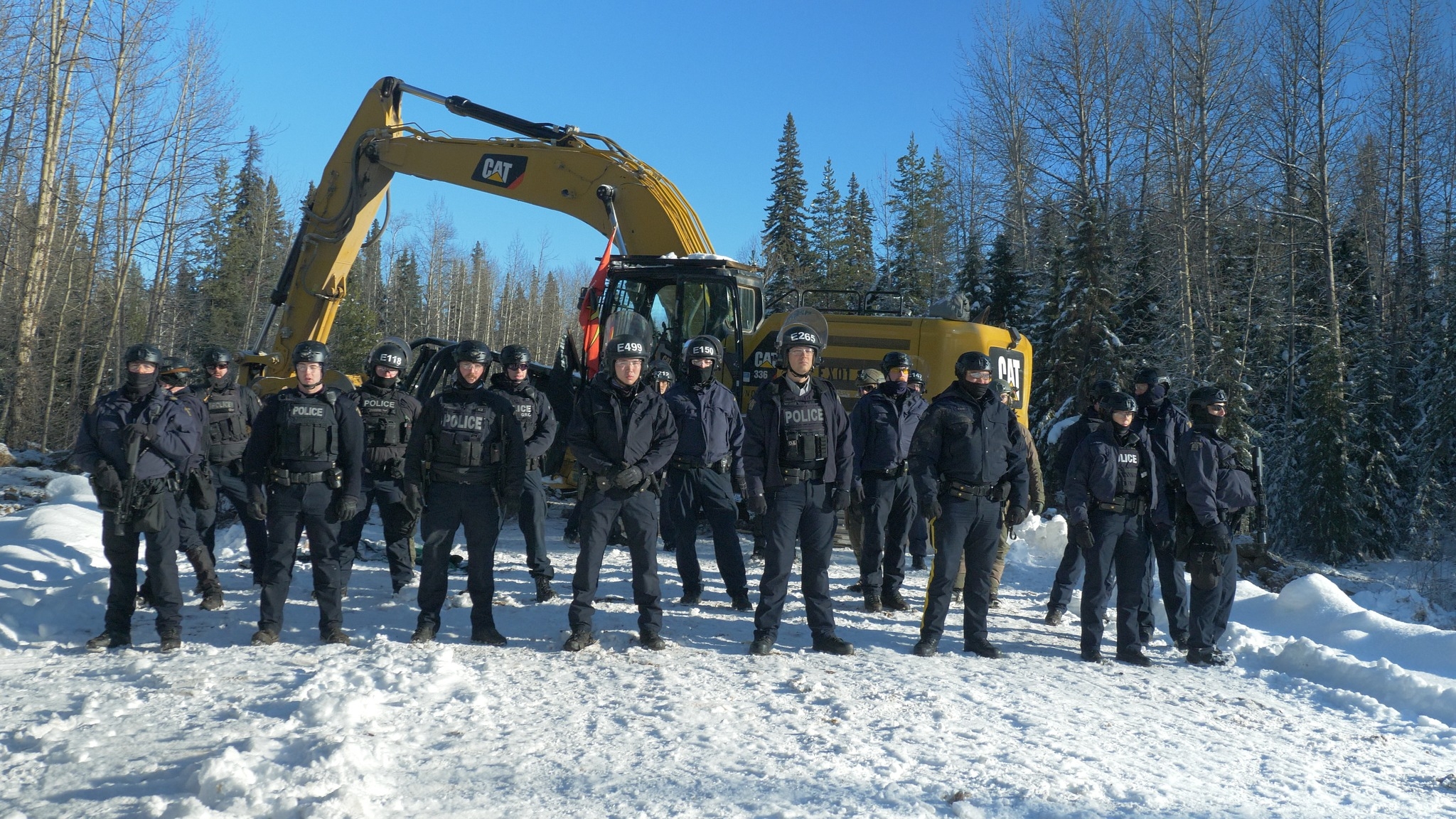 Police confronting Wet’suwet’en Nation Land Defenders