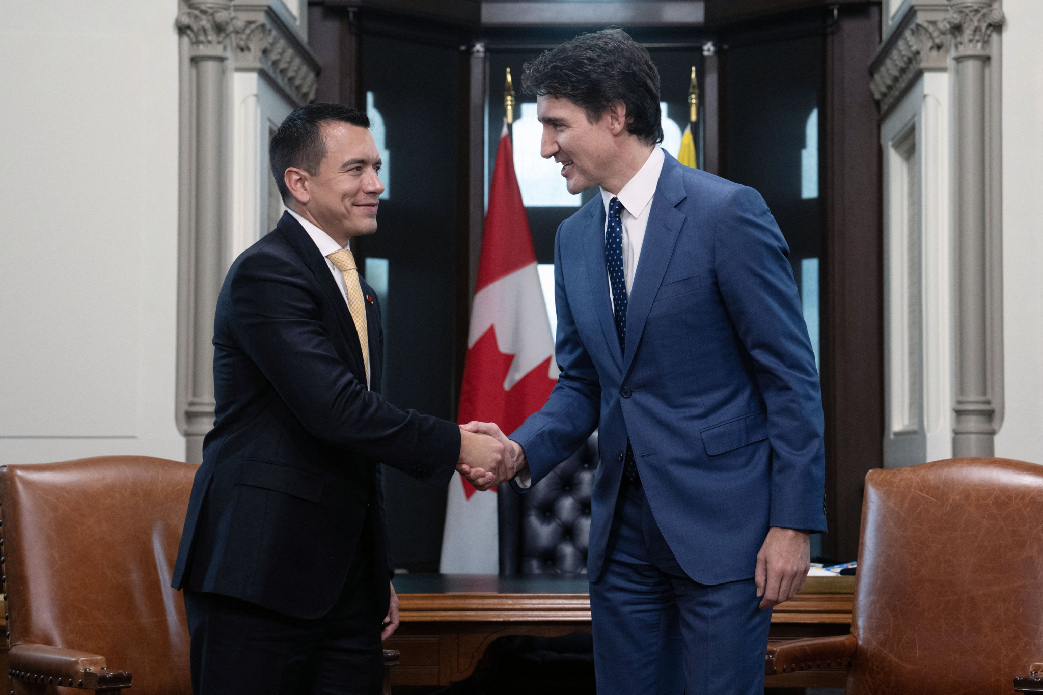 Prime Minister Justin Trudeau shakes hands with Ecuador's President Daniel Noboa at a meeting in Ottawa