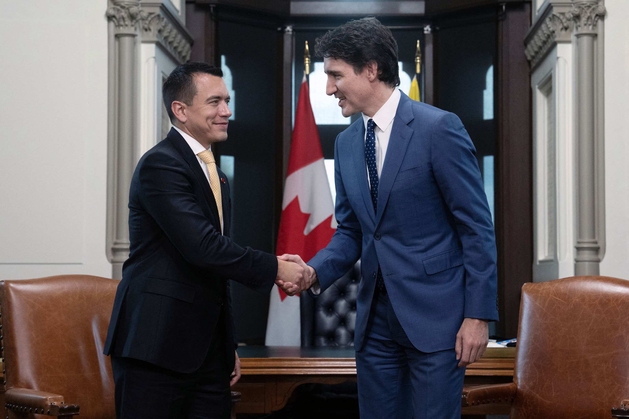 Prime Minister Justin Trudeau shakes hands with Ecuador's President Daniel Noboa at a meeting in Ottawa