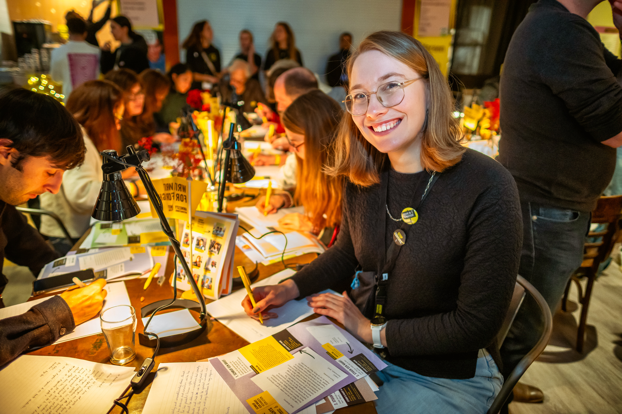 Amnesty Netherlands supporters and members take part in Write for Rights events at the organisations Amsterdam office, 10 December 2023