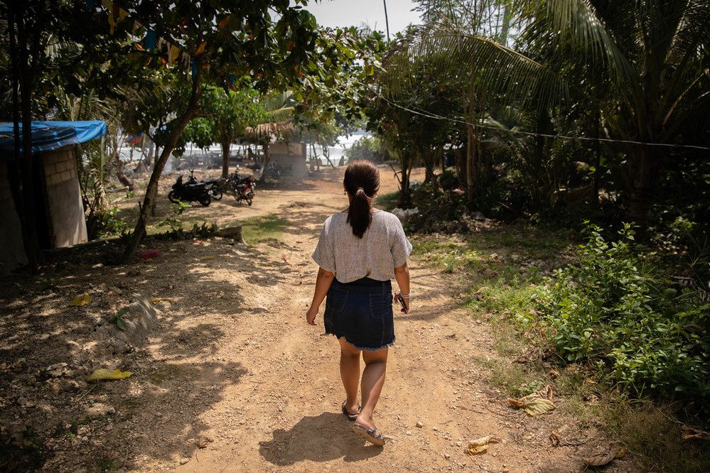 Climate activist Marinel Ubaldo walks towards Yolanda Beach in Eastern Samar, Philippines. Photo by Eloisa Lopez/Amnesty International