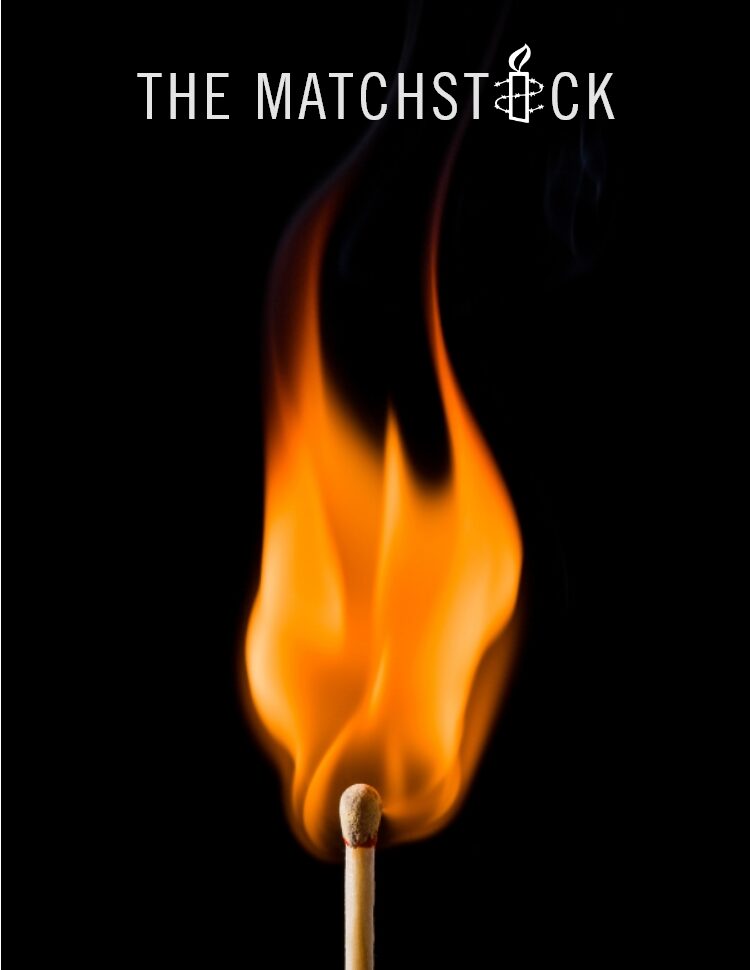 The Matchstick Magazine with a match and flame