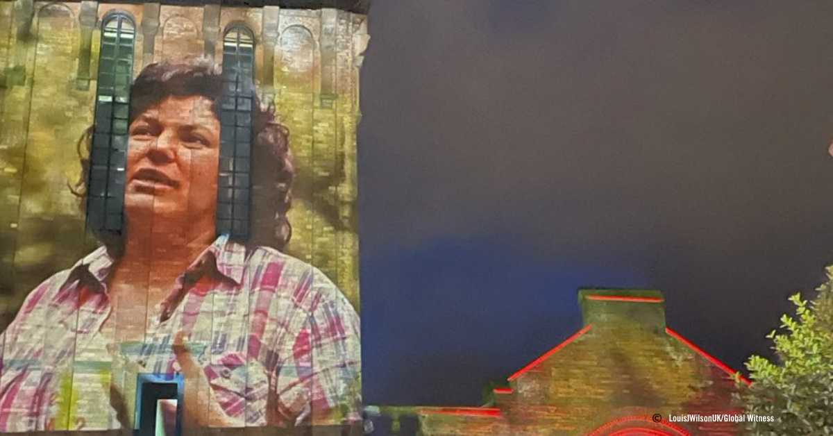 photo of woman projected on wall