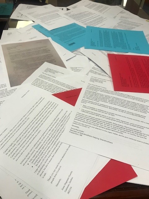 letters on white, blue and red paper