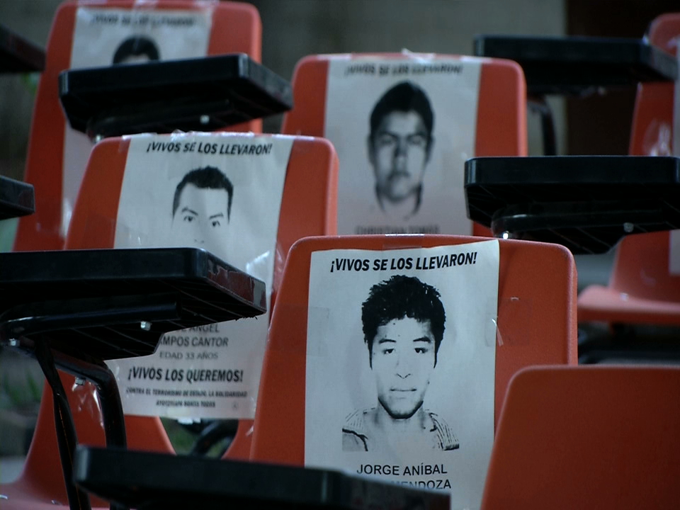 school chairs bear images of disappeared students
