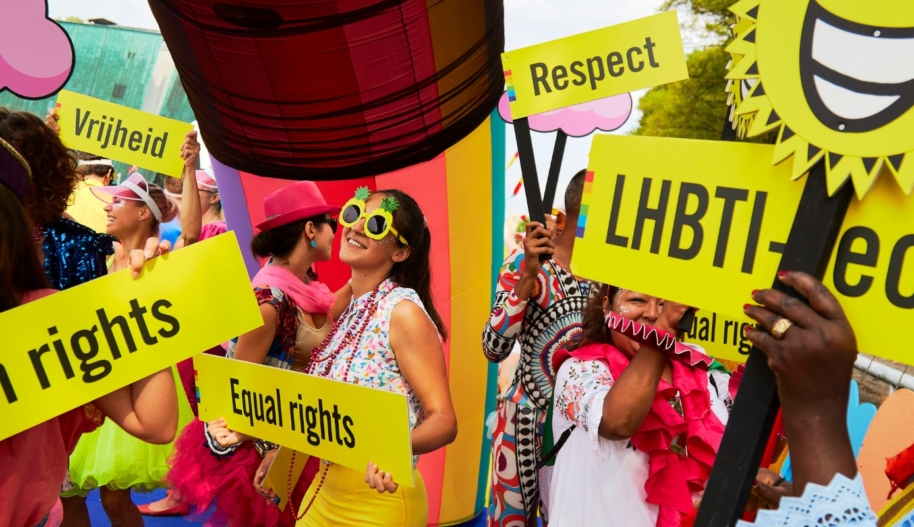 Young people hold up signs at the annual Canal LGBTQIA Pride Parade in 2019. Photo by Pierre Crom/Amnesty International NL
