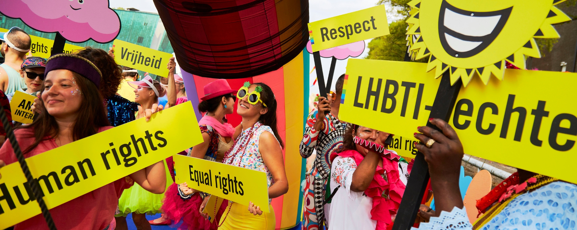 Young people hold up signs at the annual Canal LGBTQIA Pride Parade in 2019. Photo by Pierre Crom/Amnesty International NL