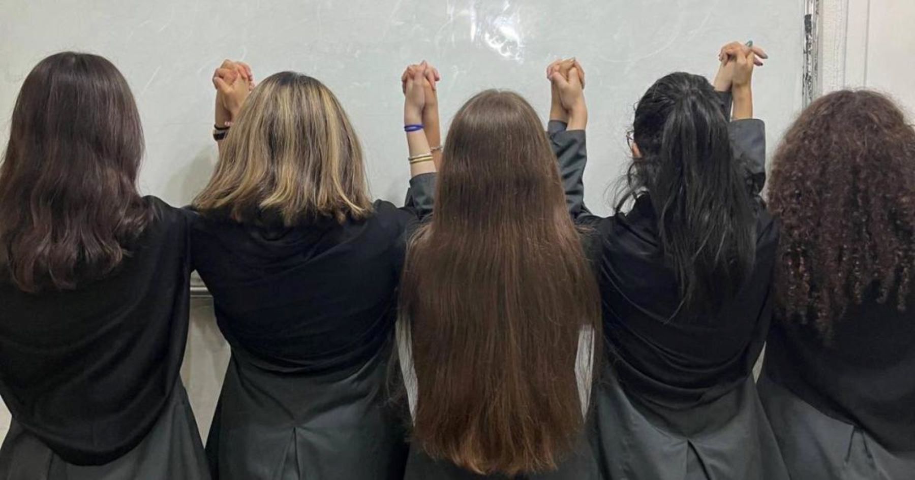 Schoolgirls in Iran have also participated through peaceful protests, including by removing their mandatory hijabs (compulsory veiling) while in their school uniforms. (c) private