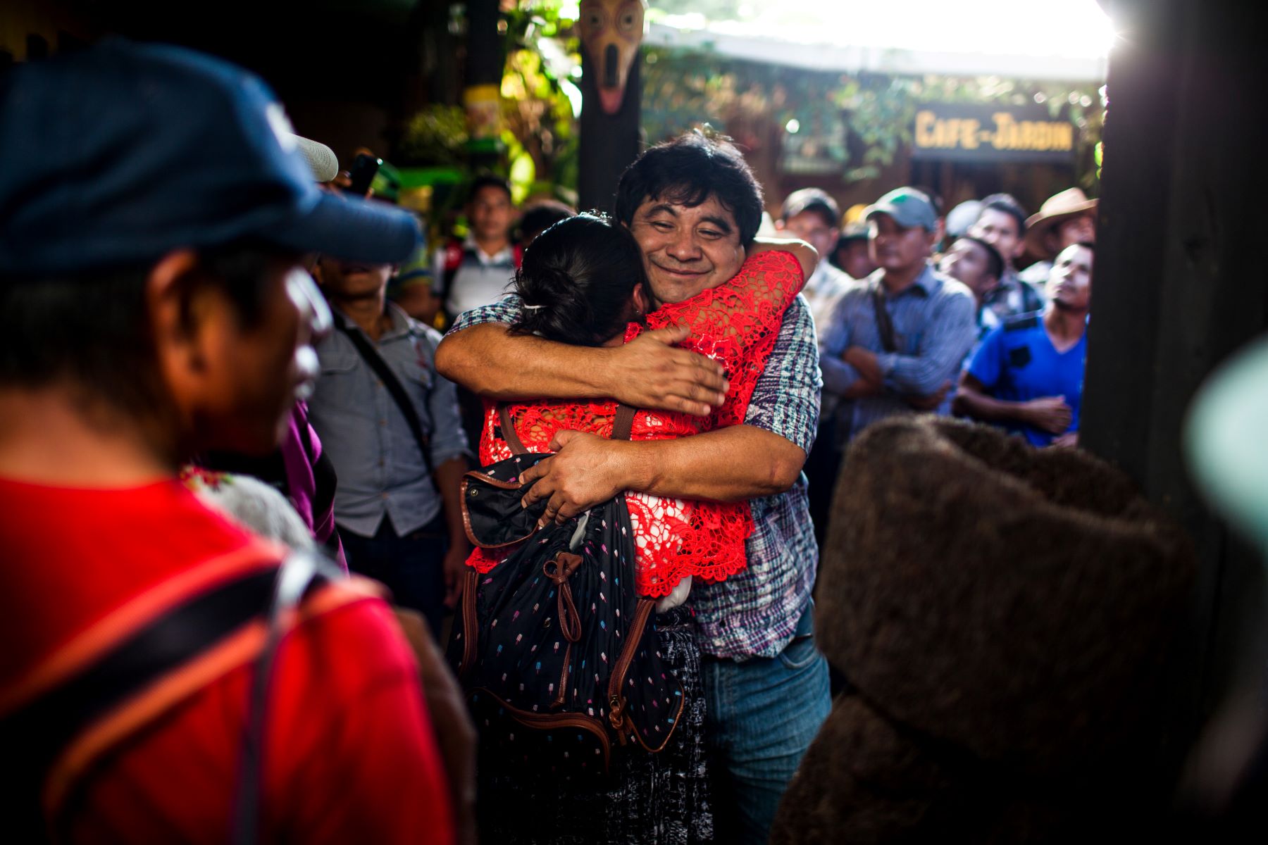 A member of the front in resistance against the hydroelectric dam hugs Bernardo Caal Xol just out of the second criminal court of first instance in Cobán, 18/07/2017. Bernardo's case was featured in Write for Rights in 2021. © Simone Dalmasso