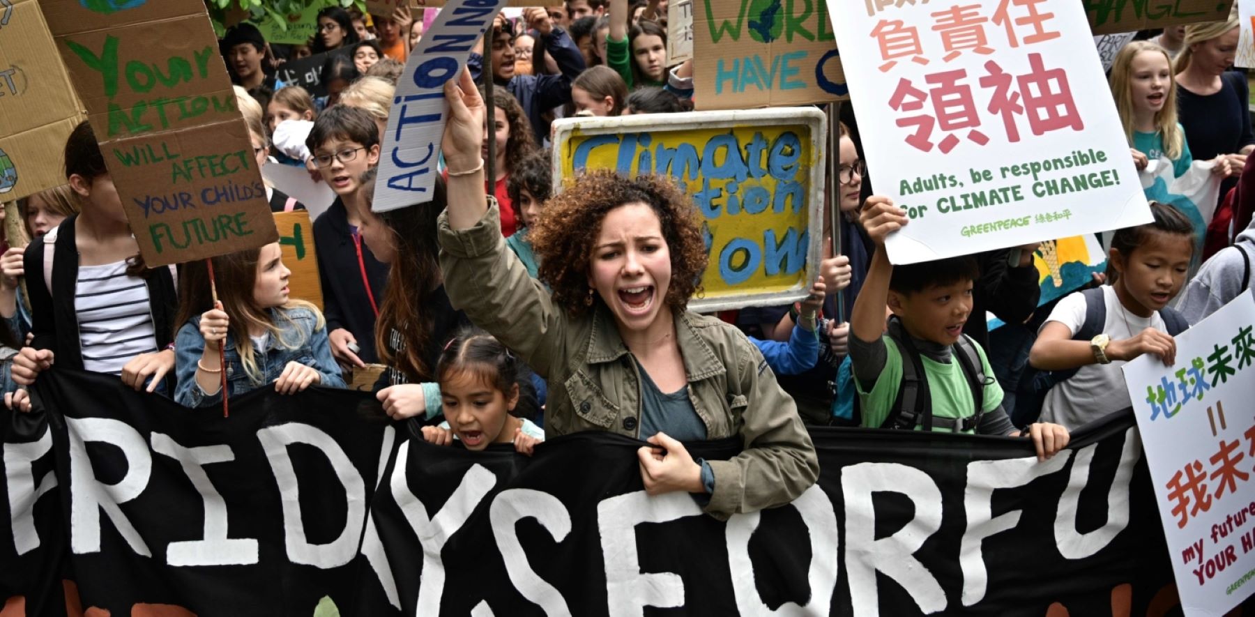 Students take part in a protest against climate change in Hong Kong on March 15, 2019, as part of a global movement called #FridaysForFuture. - Thousands of young people marched through cities in Asia on March 15, kicking off a global day of student protests that aims to spark world leaders into action on climate change. Photo by ANTHONY WALLACE/AFP via Getty Images.