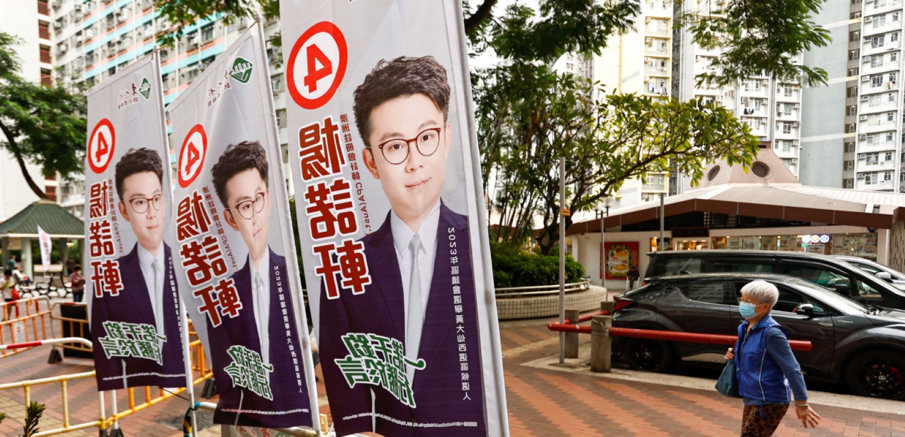 Election flags for a pro-Beijing candidate are being displayed on the polling day of the city's ''patriots-only'' District Council Election, amid crackdowns on democracy by Beijing, in Hong Kong, on December 10, 2023. No candidates from the democratic camps are being allowed to run in the election, while the Hong Kong government is also implementing Chinese-style patriotism education and has forced pro-democracy newspapers such as Apple Daily to close down. (Photo by Ceng Shou Yi/NurPhoto via Getty Images)