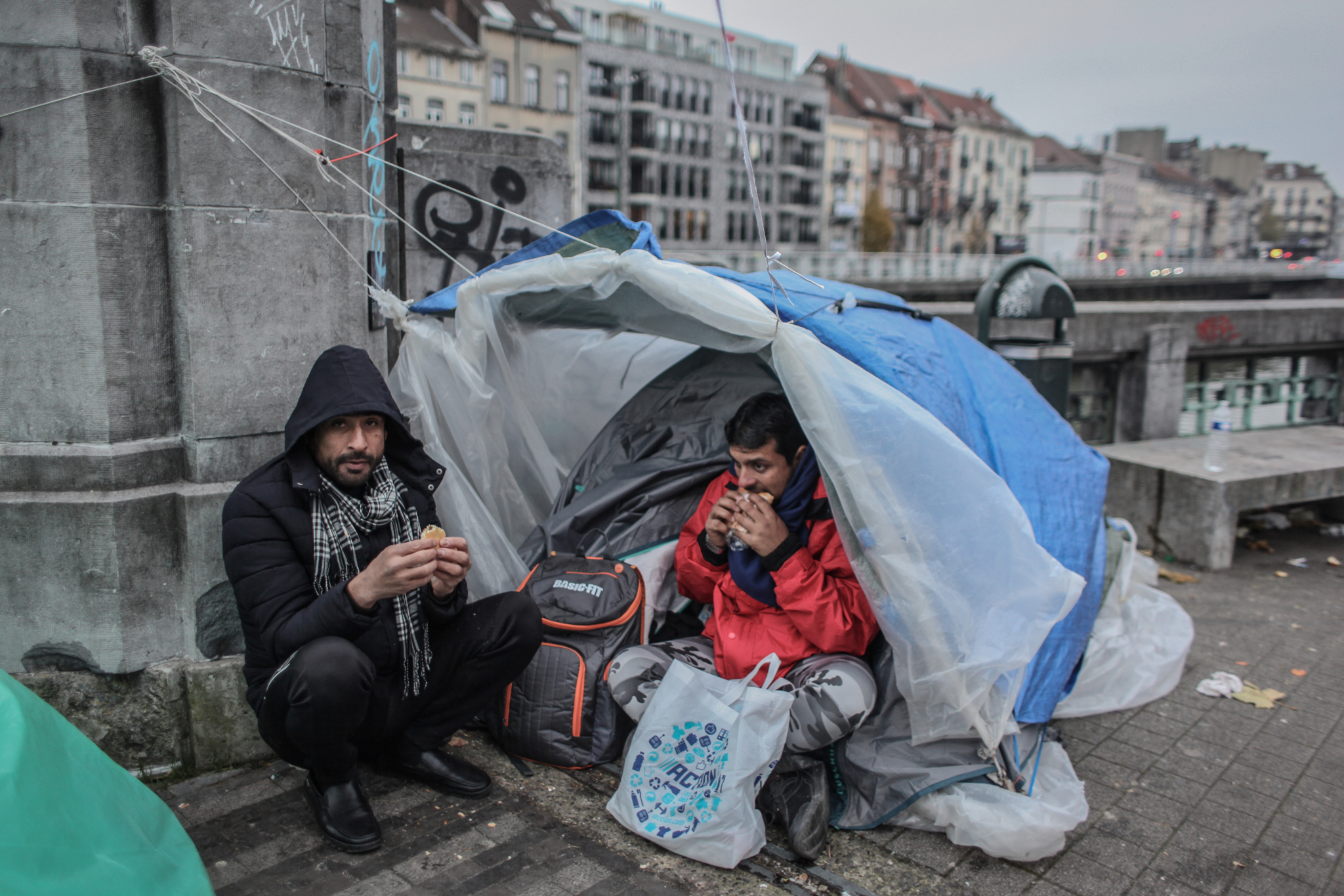 Belgian reception crisis - 2 people in makeshift tent in Brussels, Belgium.