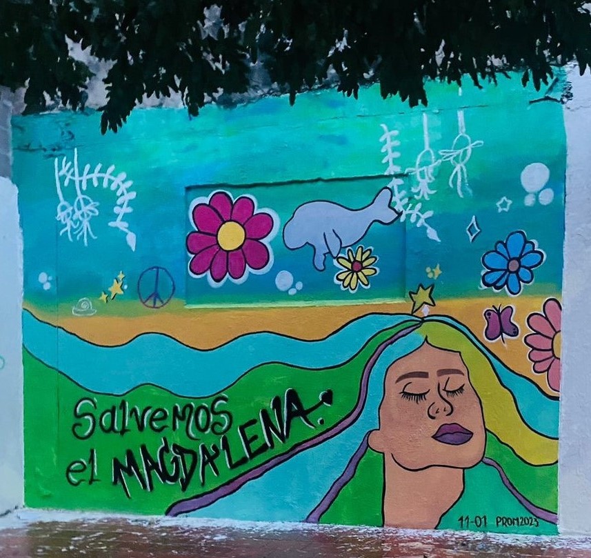 A colourful mural reads: Save the Magdalena River