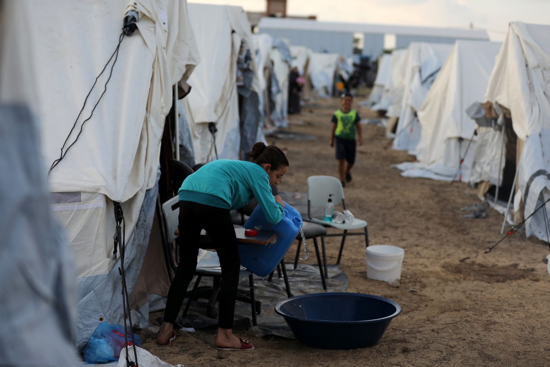 Tents for Palestinians seeking refuge are set up on the grounds of a United Nations Relief and Works Agency for Palestine Refugees (UNRWA) centre in Khan Yunis in the southern Gaza Strip on October 19, 2023 (Photo by Majdi Fathi/NurPhoto via Getty Images)