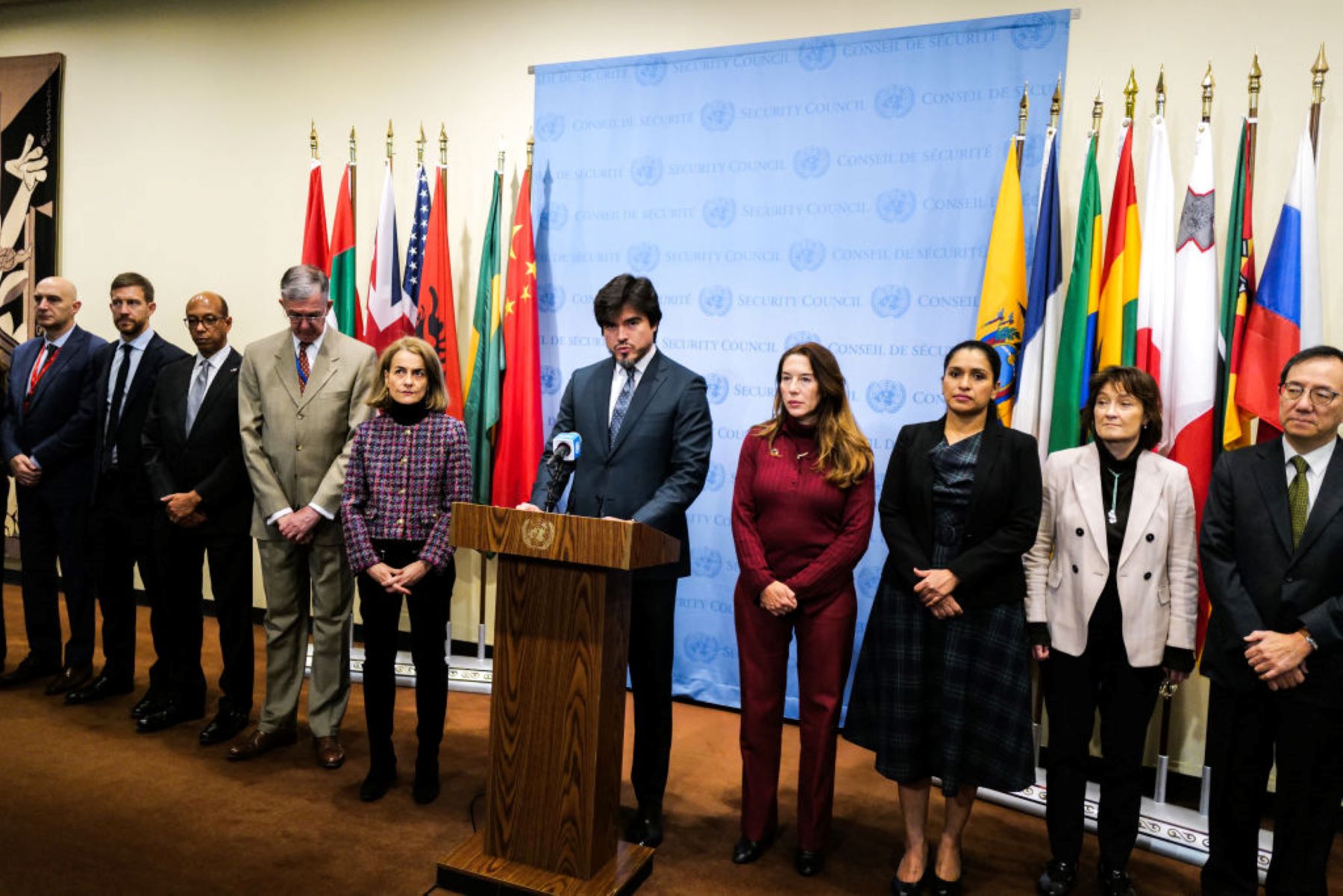 UN Security Council President and Ecuador's Permanent Representative, Jose de la Gasca (C), flanked by other UN ambassadors, speaks to the press prior to a security council meeting about the situation in Afghanistan at UN headquarters in New York City on December 20, 2023. Photo by CHARLY TRIBALLEAU/AFP via Getty Images.