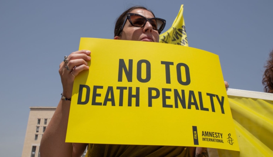 Activist holding placard No to Death Penalty. Photo by Matteo Nardone/Pacific Press/LightRocket via Getty Images