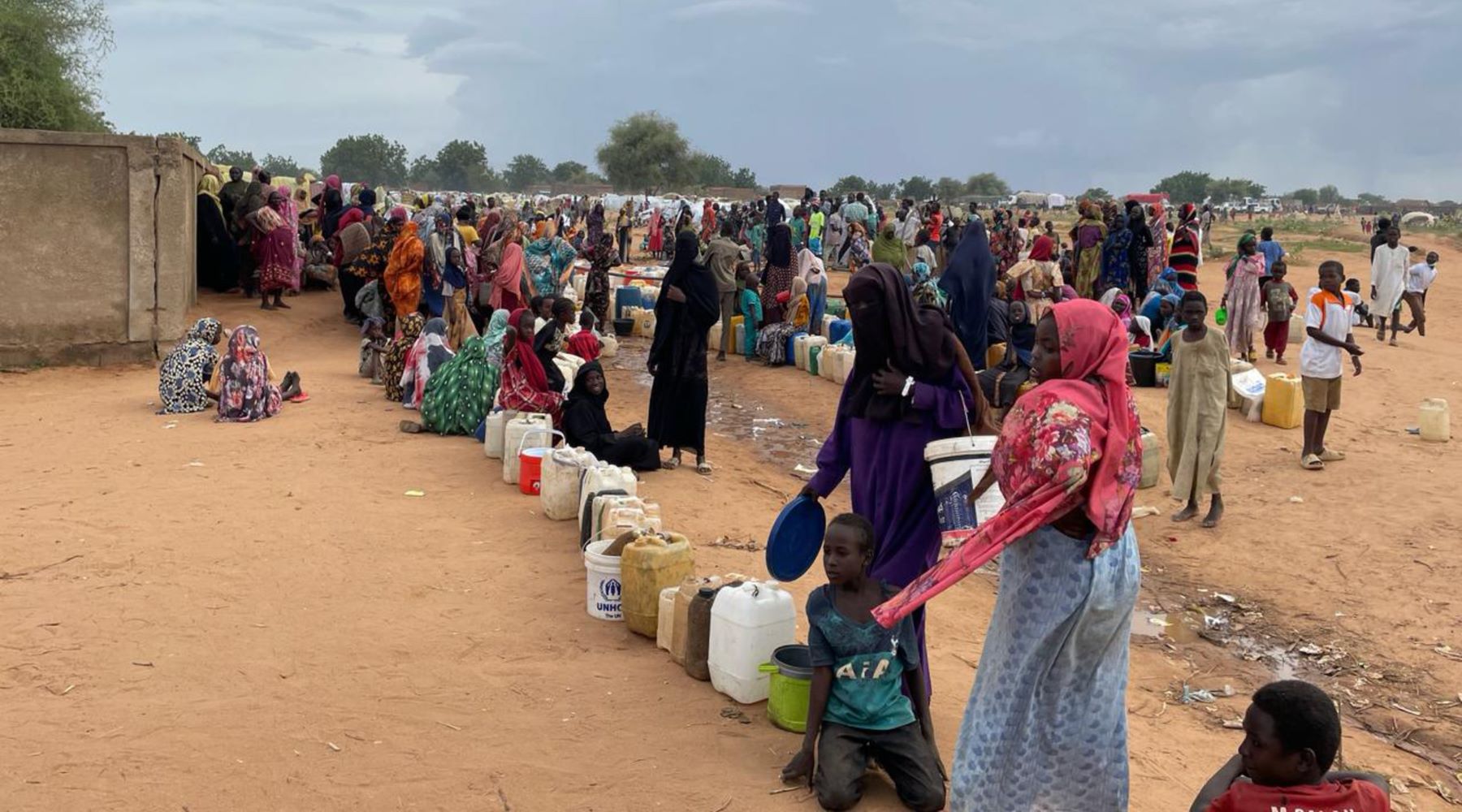 Refugees lining up to fetch water in Adre, Eastern Chad, 26 June 2023. Photo by Amnesty International.