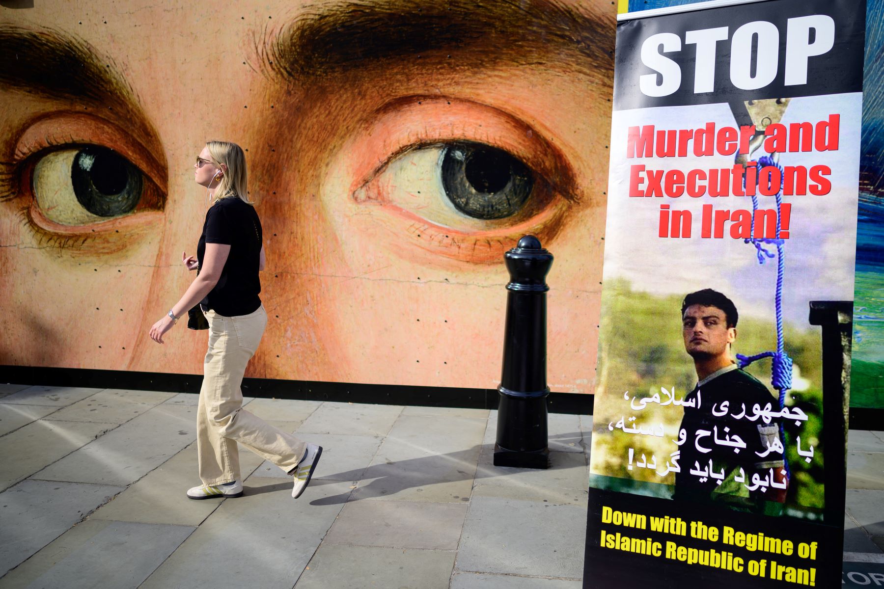 Signs criticising the Iranian Islamic Regime's use of the death penalty are seen in Trafalgar Square on September 16, 2023 in London, England. Photo by Leon Neal/Getty Images.