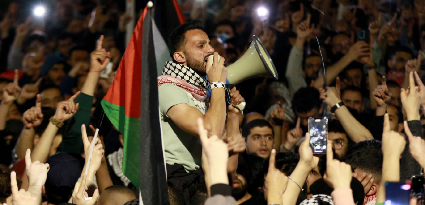 Jordanians chant slogans during a demonstration near the Embassy of Israel in Amman on March 28, 2024, in support of Palestinians amid ongoing battles between Israel and the militant Hamas group in the Gaza Strip. Photo by KHALIL MAZRAAWI/AFP via Getty Images.