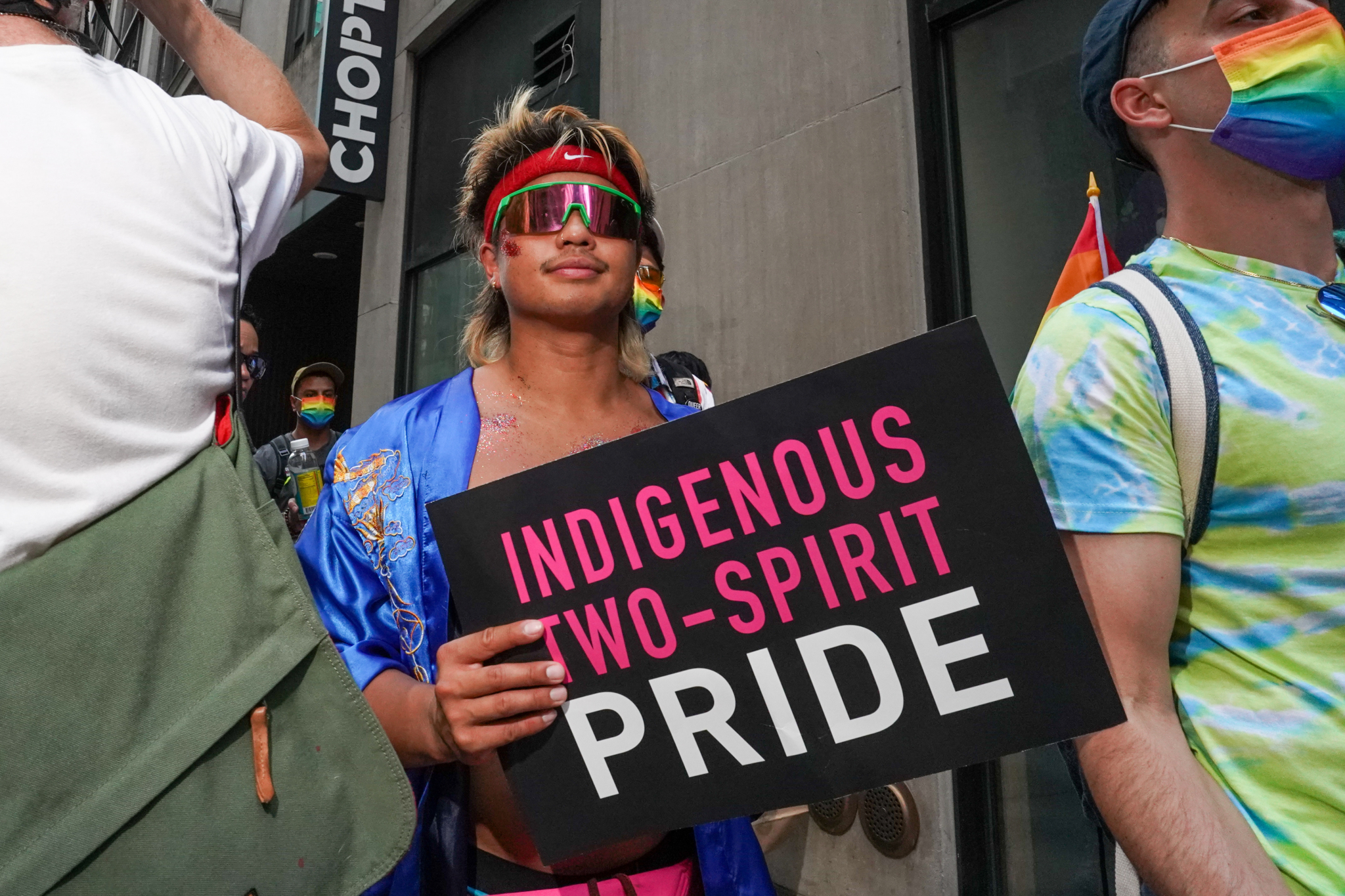 A person carries a sign that reads "Indigenous Two-Spirit Pride" during the Queer Liberation March on June 27, 2021, in New York City.  The Queer Liberation March is an alternative Pride celebration free of police officers and major corporate sponsors. (Photo by David Dee Delgado/Getty Images)