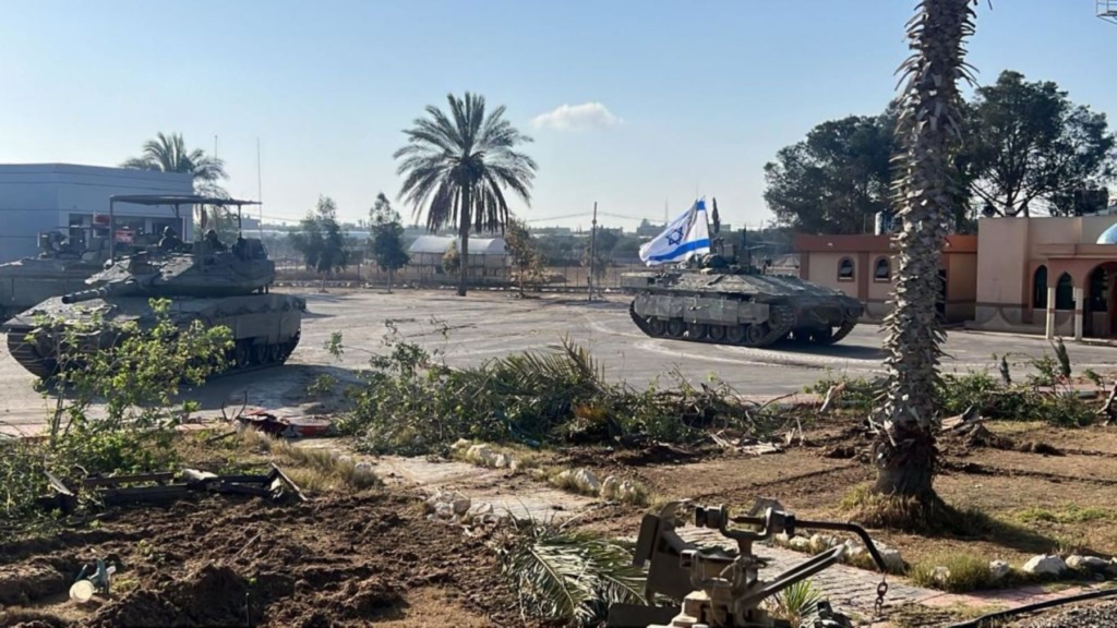 Israeli tanks are seen by the border as the Israeli army announced that it has taken control of the Palestinian side of the Rafah border crossing in Rafah, Gaza on May 06, 2024. Photo by IDF - Handout/Anadolu via Getty Images.