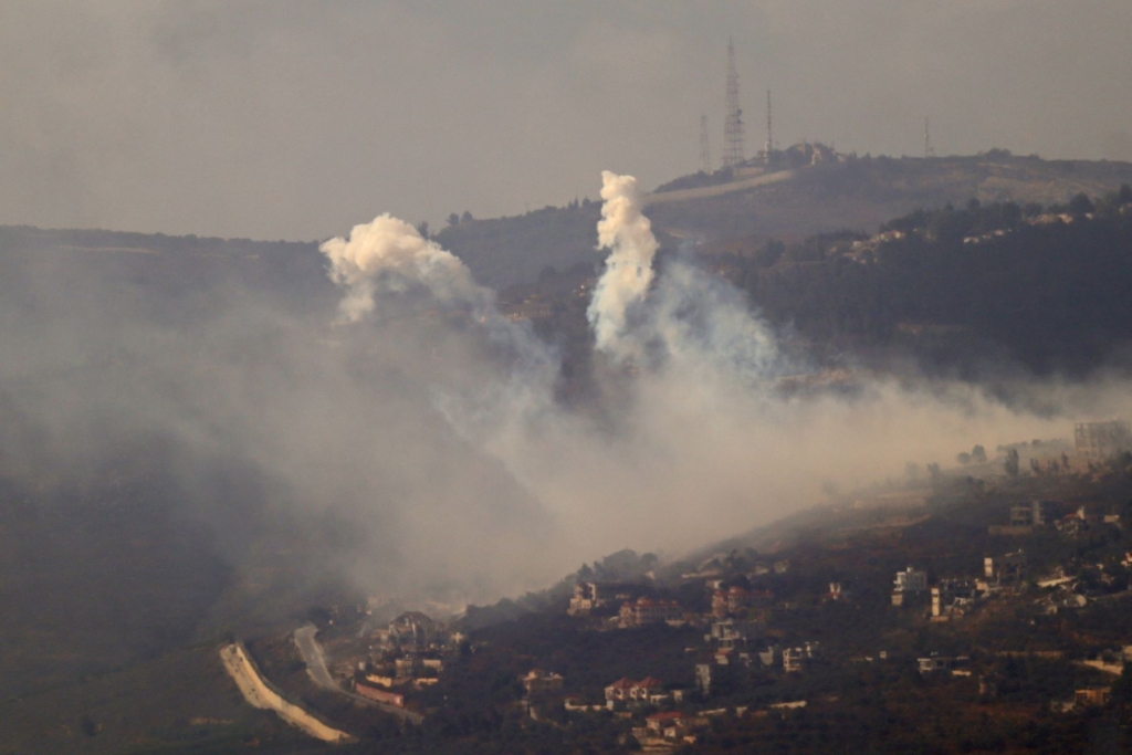 Smoke rises from the site of Israeli artillery shelling on the southern villages of Adeisseh and Kfar Kila along the border with Israel on October 1, 2024. Photo by AFP via Getty Images.