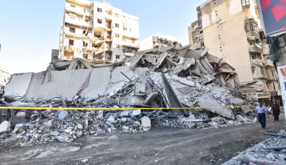 A view of the destruction after the Israeli army targets Bank Kared Al Hassan with a series of airstrikes on the suburb of Dahieh, as debris removal work continues in the area in Beirut, Lebanon, on October 21, 2024. A building targeted in the attack collapses, causing damage to surrounding buildings and vehicles. Photo by Fadel Itani/NurPhoto via Getty Images.