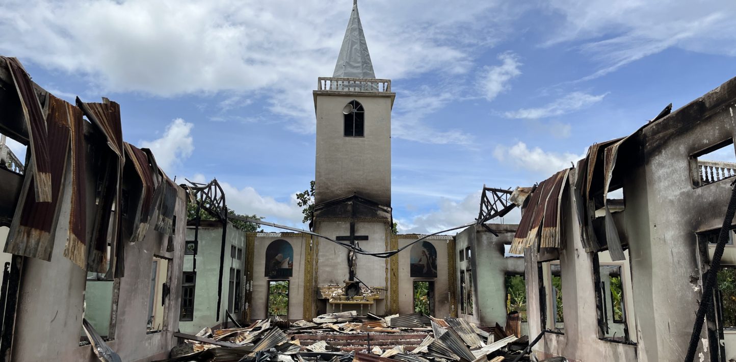 Building with rubble around it