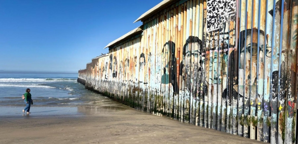 Header image of the US-Mexico border wall by Alli McCracken/Amnesty International.