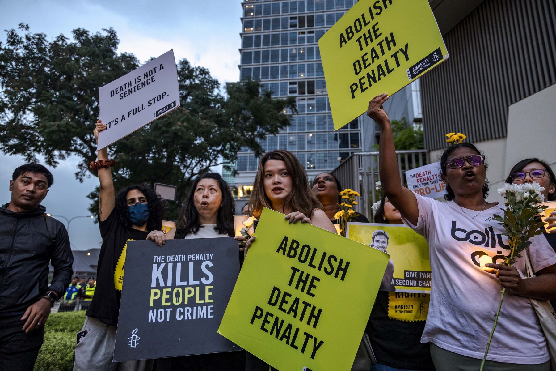 Activists attend a candlelight vigil against the impending execution of Pannir Selvam Pranthaman, sentenced to death for drug trafficking into Singapore, outside the Singaporean embassy in Kuala Lumpur, Malaysia, on February 19, 2025. Photo by Mohd Firdaus/NurPhoto via Getty Images.