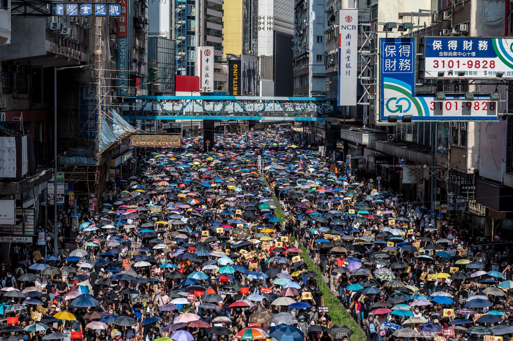 Protesters are seen holding up umbrellas during a march in Hong Kong on September 15, 2019. Photo by Vernon Yuen/NurPhoto via Getty Images.