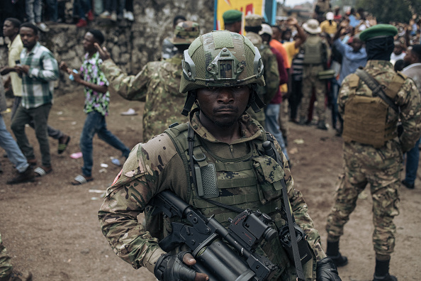 DRC Soldier in uniform and holding a weapon