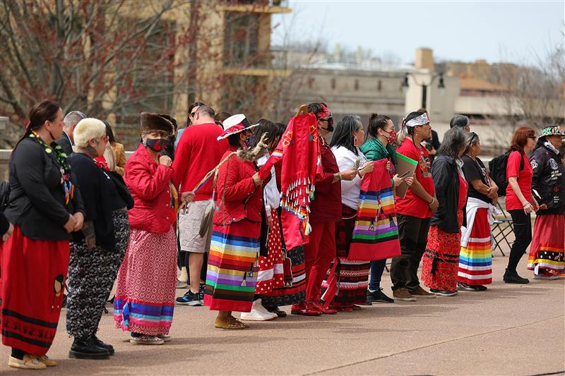 Demonstrators stand outside of the Wisconsin State Capitol to commemorate Missing and Murdered Indigenous Women and Girls on May 05, 2022 in Madison, Wisconsin.