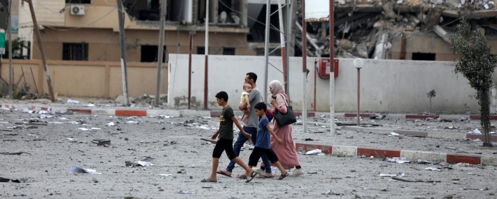 Palestinians inspect the massive destruction from Israeli airstrikes in Gaza City's al-Rimal district, on October 10, 2023. Photo by Majdi Fathi/NurPhoto via Getty Images.