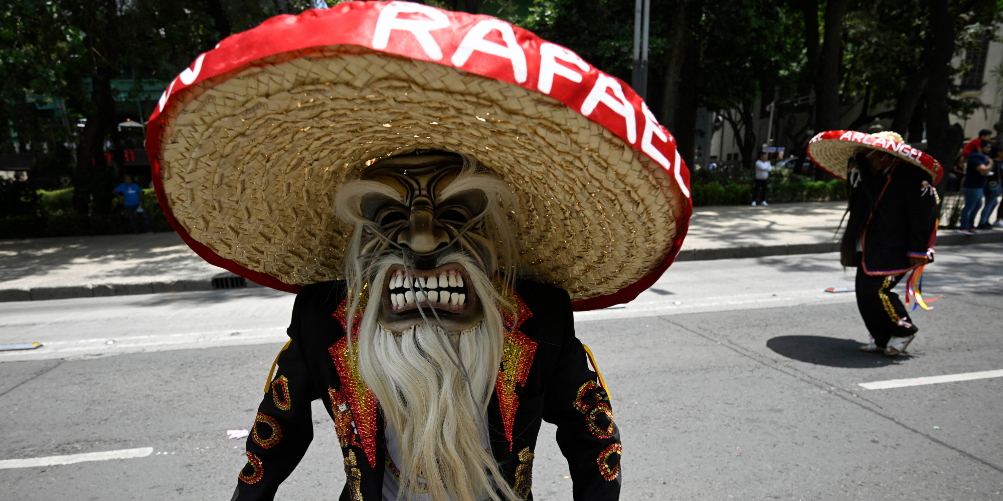Indigenous People participate in a march commemorating the International Day of the World's Indigenous Peoples in Mexico City on August 9, 2023. (Photo by ALFREDO ESTRELLA/AFP via Getty Images)
