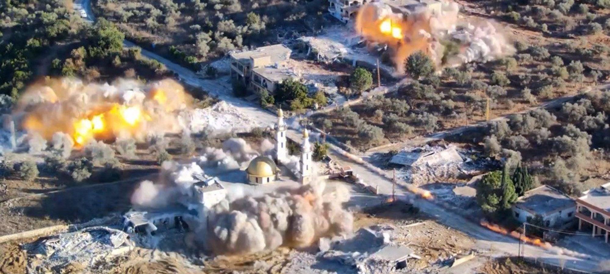 A frame of a video circulated on social media in November 2024 shows the destruction by manually laid explosives of a mosque and nearby buildings in Dhayra, southern Lebanon.