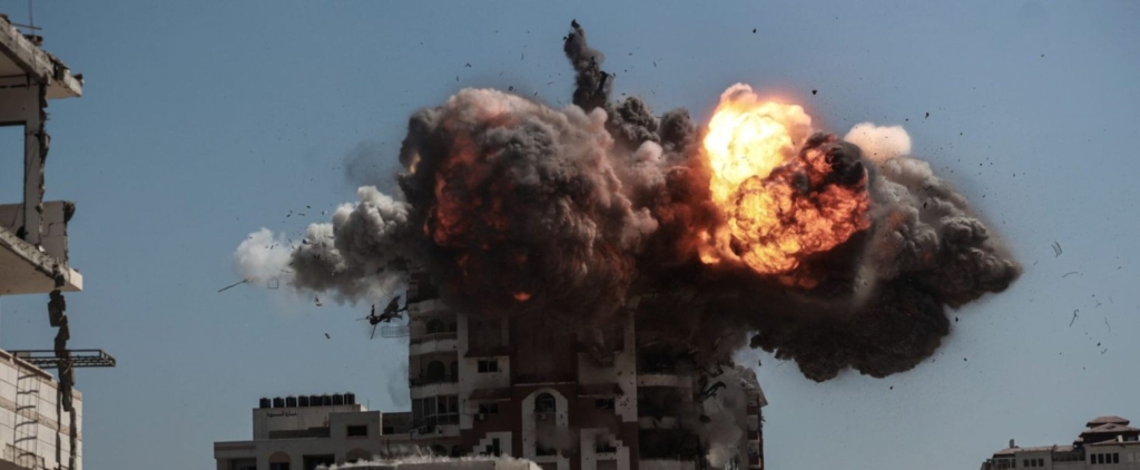 Smoke rises following Israeli airstrikes that hit and destroyed multiple buildings and high-rise towers in Gaza City, Gaza on September 14, 2025. Photo by Abdalhkem Abu Riash/Anadolu via Getty Images.