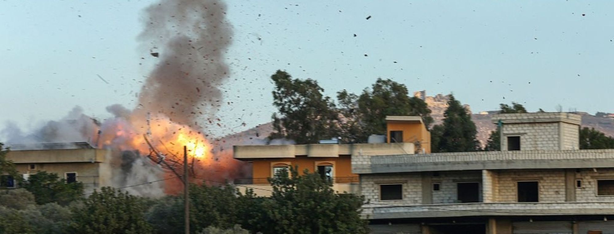 A fireball erupts amid Israeli strikes in the southern Lebanese village of Kfar Tibnit on September 18, 2025. Photo by MAHMOUD ZAYYAT/AFP via Getty Images.