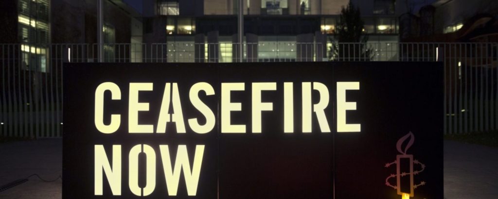 Ceasefire Now banner © Stephane Lelarge/Amnesty International