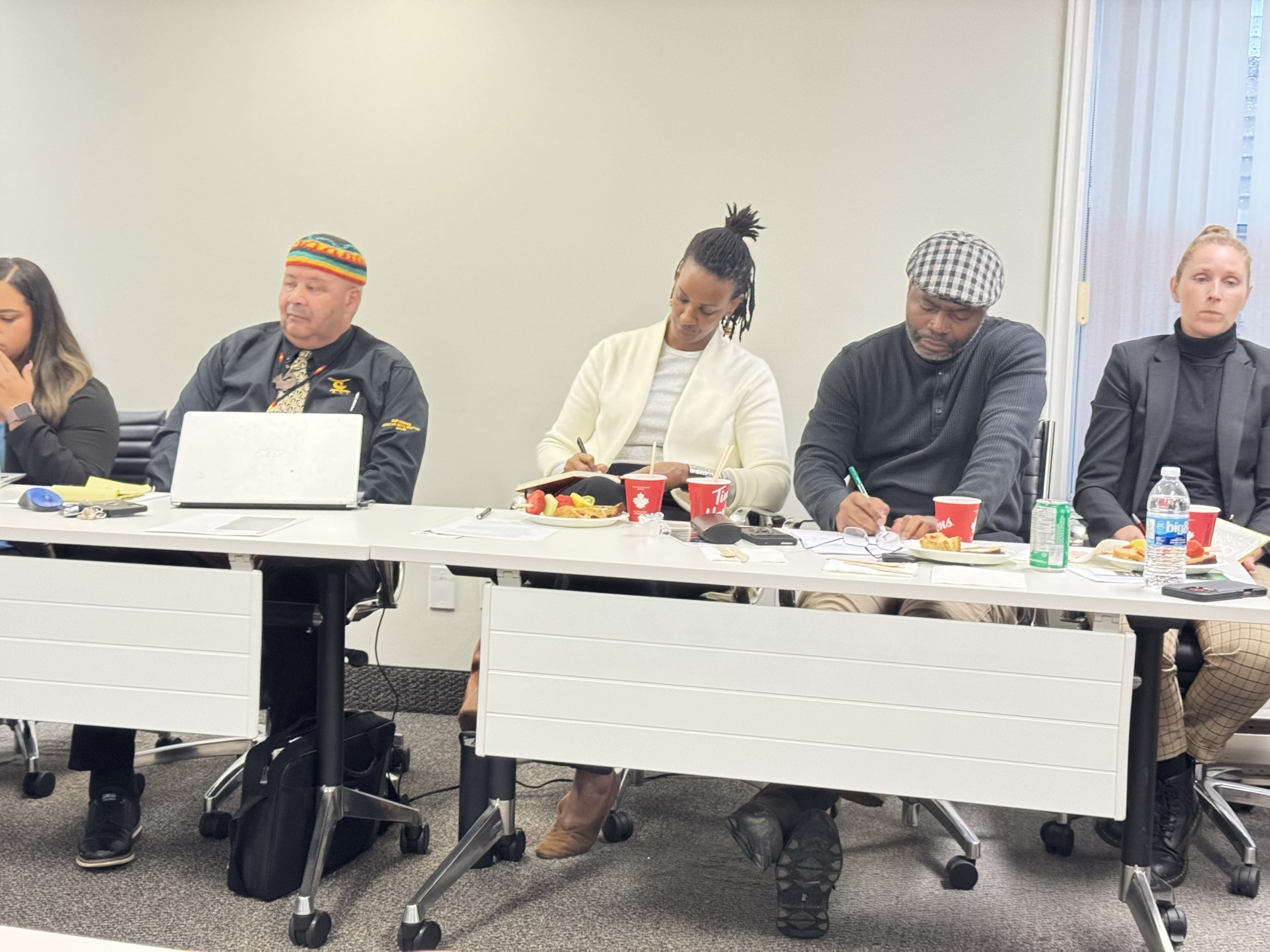 Photo: Amnesty International Canada’s team and other Roundtable participants at the ANSJI office 