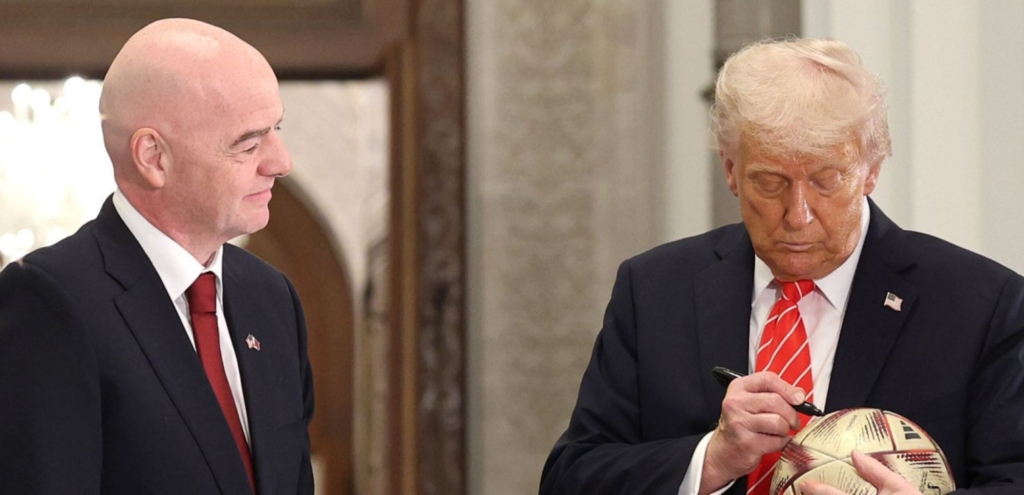 FIFA President Gianni Infantino and U.S. President Donald J. Trump sign a football during a World Cup 2026 ceremony after a state dinner at the Lusail Palace on May 14, 2025, in Doha, Qatar. Photo by Win McNamee/Getty Images.