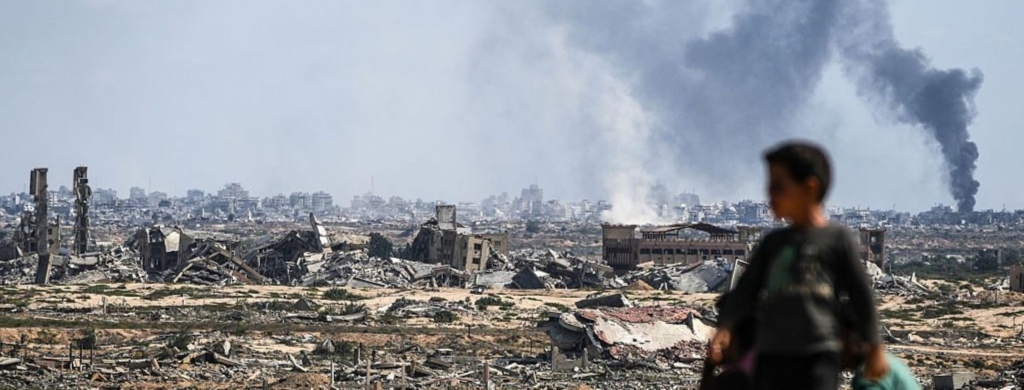 Smoke rises over Gaza City after an Israeli attack, as seen from Nuseirat, Gaza on October 02, 2025. Photo by Khames Alrefi/Anadolu via Getty Images.