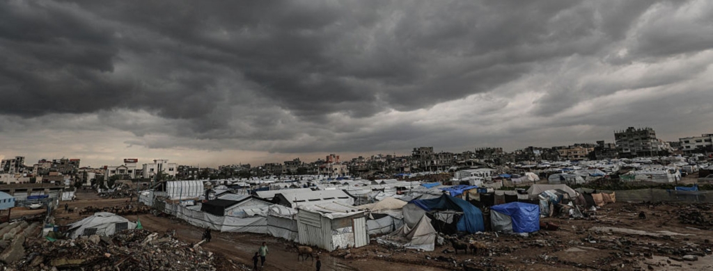 Palestinians struggle with flooding after heavy rain hits the Bureij Refugee Camp in Gaza City, Gaza on December 16, 2025. Photo by Moiz Salhi/Anadolu via Getty Images.